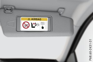 System przytrzymujący dziecko podczas kolizji na przednim fotelu pasażera 
